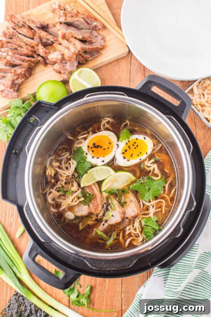 Instant Pot Pork Ramen Recipe: Homemade Broth in 30 Minutes 14 Instant Pot filled with ramen broth, noodles, sliced pork, soft-boiled eggs, cilantro, green onions, bean sprouts, lime wedges, and black sesame seeds