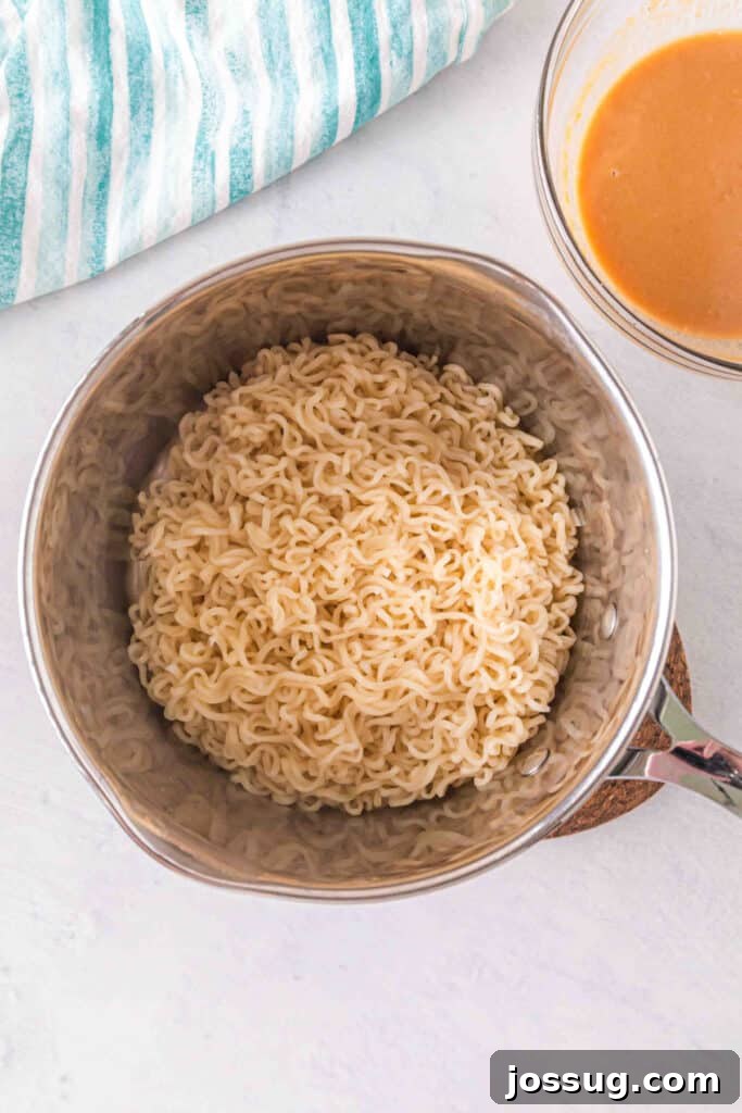 Creamy Peanut Butter Ramen Noodles Recipe in 10 Minutes 6 Cooked ramen noodles drained and ready to be tossed with creamy peanut sauce.