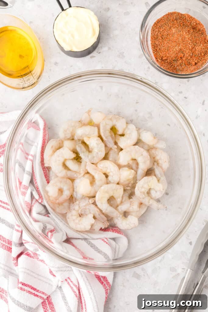 Smoky Barbecue Shrimp Po' Boy Sandwich Recipe 6 Raw shrimp tossed with oil before seasoning