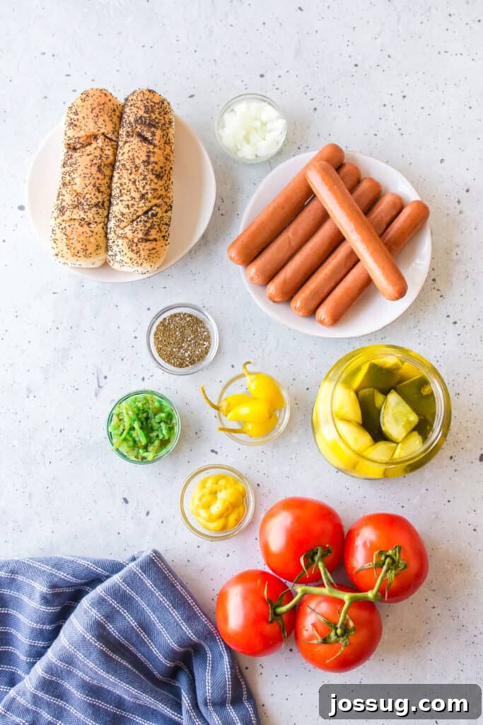 Ingredients for authentic Chicago Hot Dogs including all-beef hot dogs, poppy seed buns, sport peppers, relish, mustard, tomatoes, onions, pickles, and celery salt