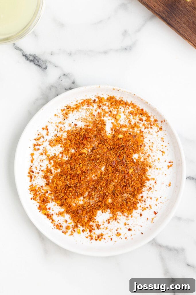 Jalapeño Margarita: Spicy Lime Cocktail Recipe 9 Tajín seasoning spread on a plate for rimming a margarita glass