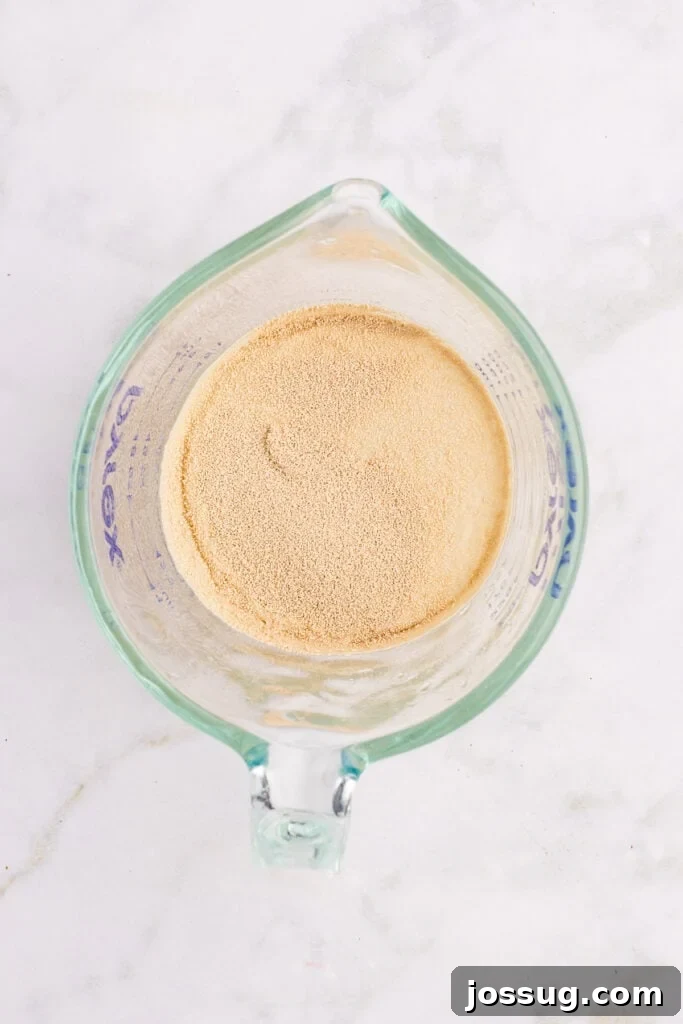 How to Make Soft Homemade Hamburger Buns 5 Active dry yeast blooming in warm water for homemade hamburger buns