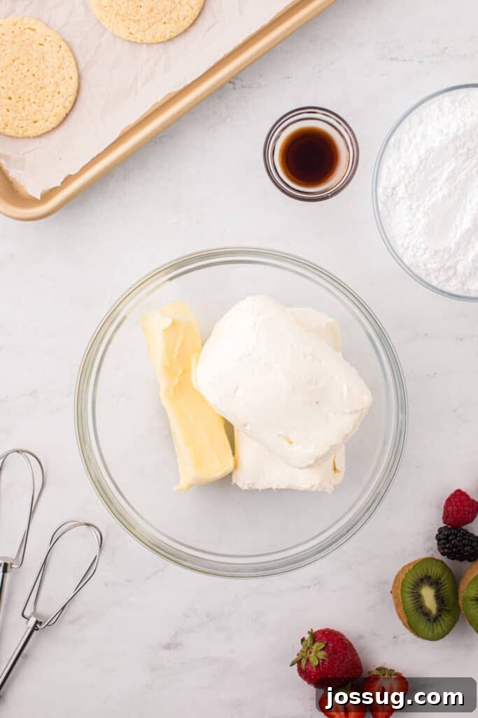 Fruit Pizza Cookies: Sugar Cookie Dessert with Fresh Fruit 9 Cream cheese and butter ready to make the frosting for Fruit Pizza Cookies.