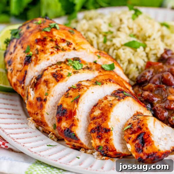 sliced margarita chicken on white plate