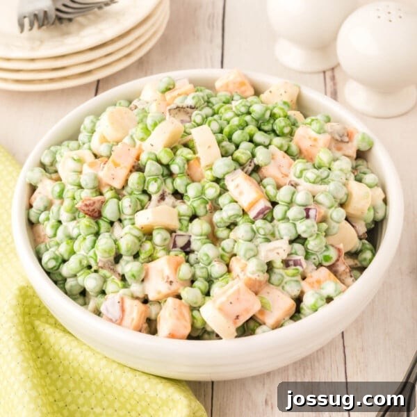 Slow Cooker Hot Dog Chili with Homemade Chili Sauce 14 Creamy pea salad in white bowl