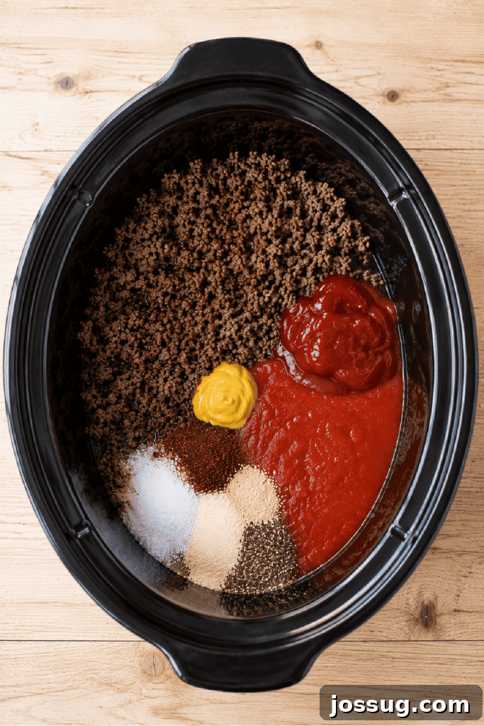Slow Cooker Hot Dog Chili with Homemade Chili Sauce 6 Ground beef and seasonings added to a slow cooker before cooking hot dog chili.