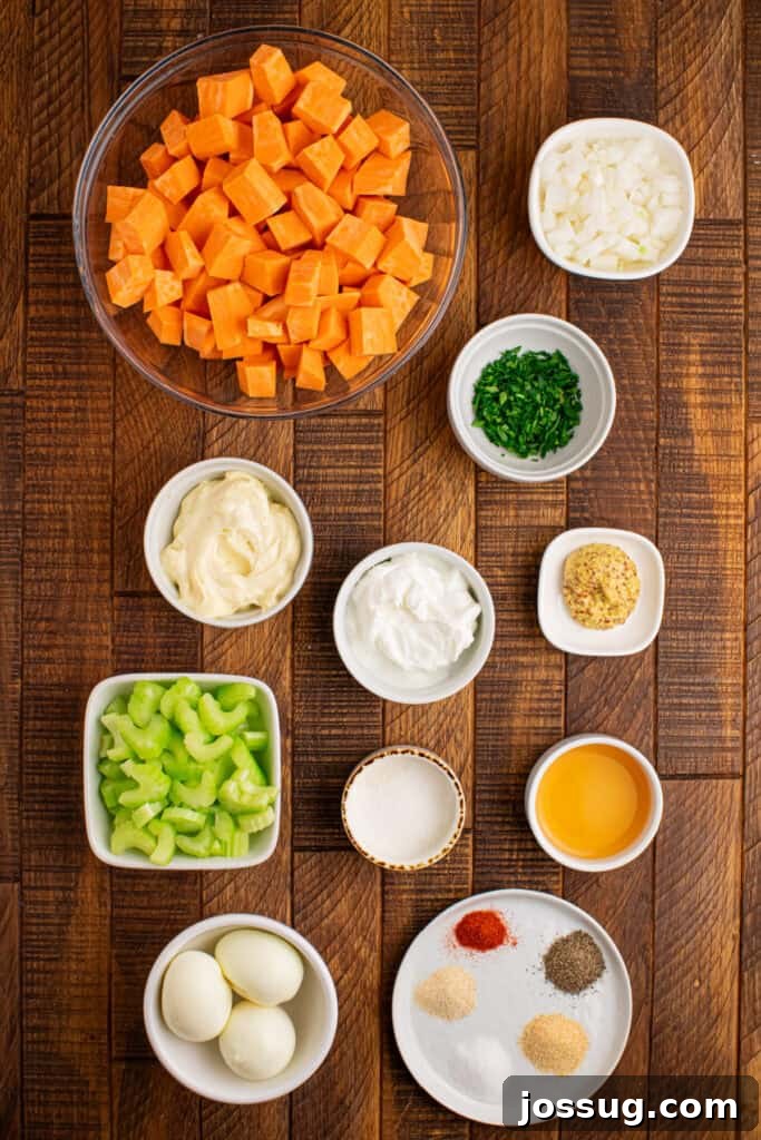 Southern-Style Sweet Potato Salad Recipe 3 Ingredients for homemade Sweet Potato Salad arranged in bowls, including cubed sweet potatoes, eggs, celery, onion, and creamy dressing ingredients