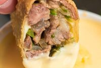Crispy Philly Cheesesteak Egg Rolls with Steak & Cheese