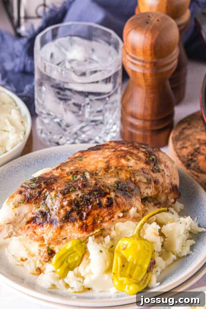 Smoked Mississippi Chicken with Ranch and Pepperoncini 2 Smoked chicken breast served over mashed potatoes with roasted pepperoncini
