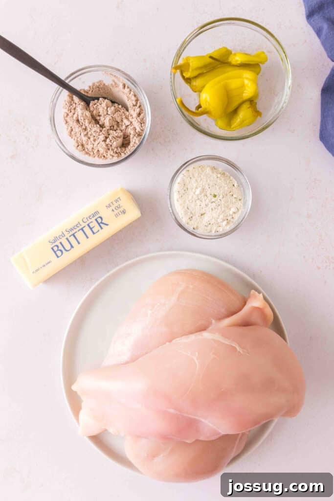 Smoked Mississippi Chicken with Ranch and Pepperoncini 3 Ingredients for Mississippi chicken including chicken breasts, butter, pepperoncini, ranch seasoning, and au jus mix