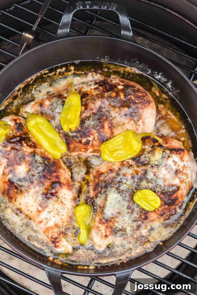 Smoked Mississippi Chicken with Ranch and Pepperoncini 9 Cooked Mississippi chicken breasts with pepperoncini and buttery pan juices on the smoker