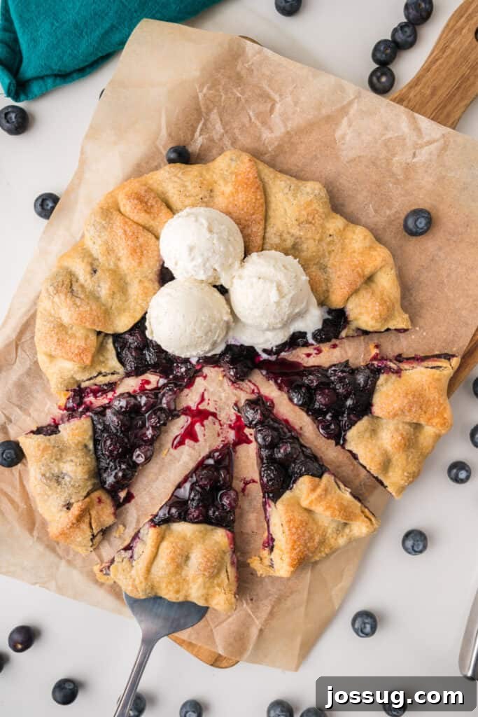 Rustic Fresh Blueberry Galette Recipe 10 Sliced Blueberry Galette topped with scoops of vanilla ice cream and surrounded by fresh blueberries