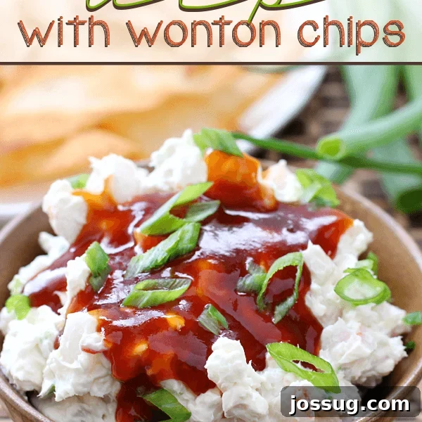 Crab Rangoon Dip with Wonton Chips in a brown bowl.
