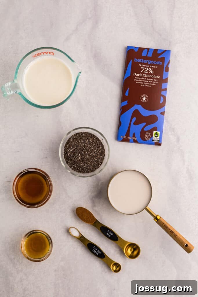 Creamy Chocolate Chia Pudding Recipe 3 Ingredients for homemade Chocolate Chia Pudding including chia seeds, dark chocolate, cream, almond milk, maple syrup, vanilla, cinnamon, and salt
